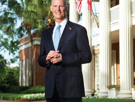 Portrait of Florida Governor Rick Scott in front of the mansion by Tallahassee photographer Scott Holstein.