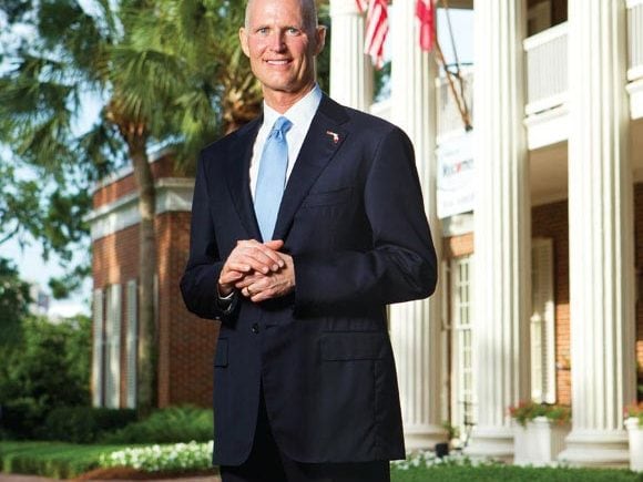Portrait of Florida Governor Rick Scott in front of the mansion by Tallahassee photographer Scott Holstein.
