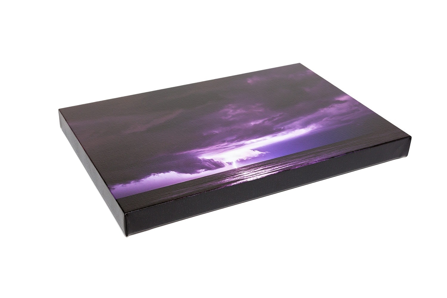 A canvas gallery wrap constructed with fine art canvas stretched over a wooden frame and finished with a protective semi-gloss laminate. Canvas gallery wraps are ready-to-hang wall decor for home or office.